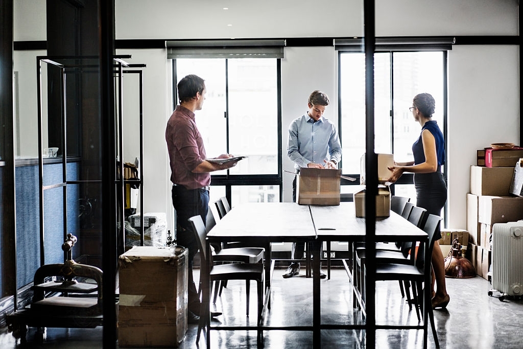 three people in an office